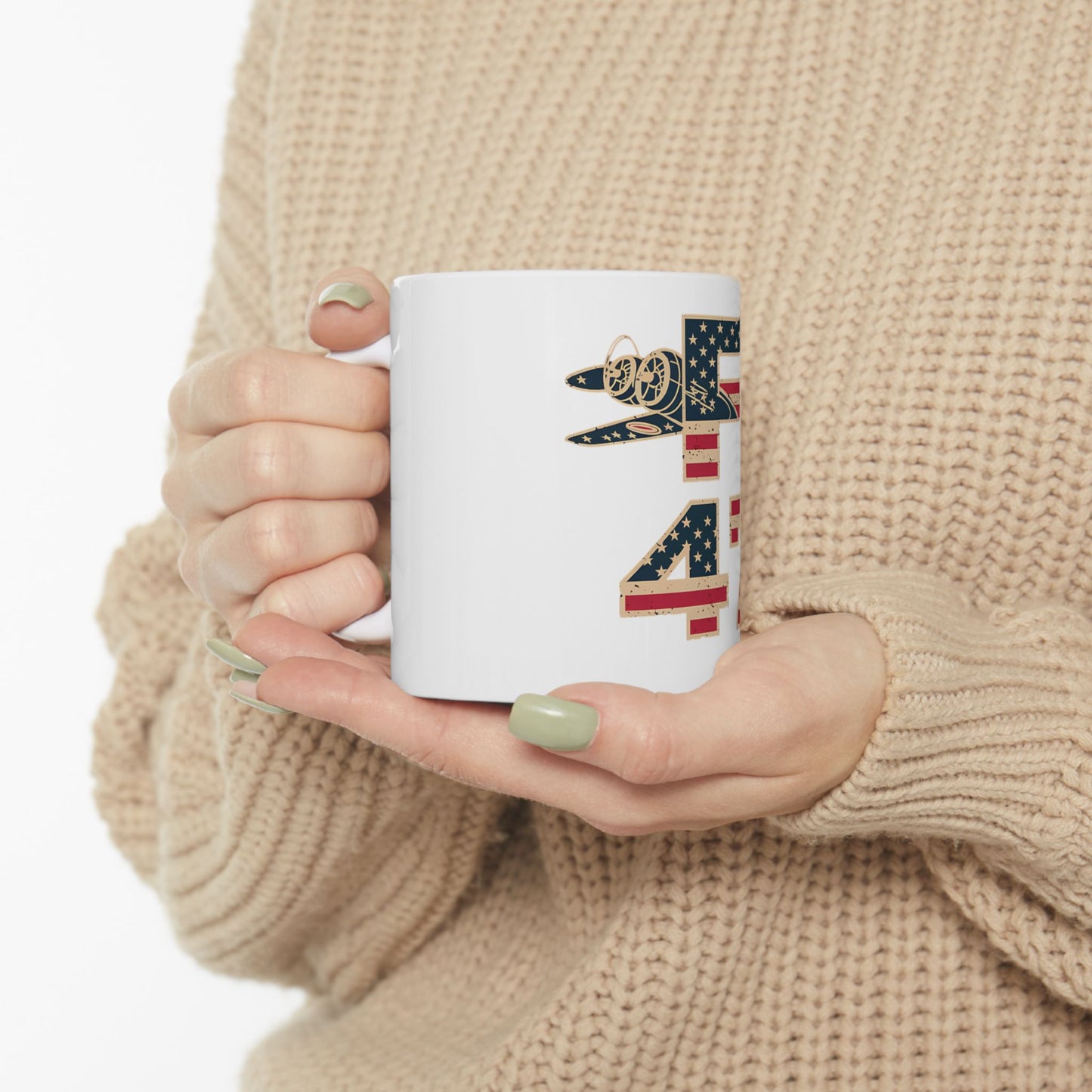 White mug with "USA" in flag design and airplane graphic.