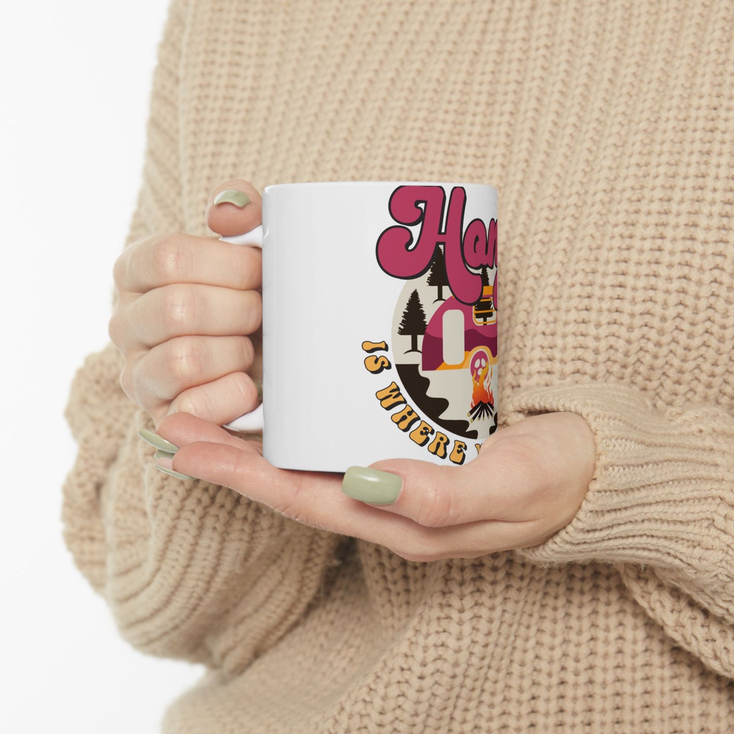 Mug with "Home is Where the Camper Is" text and cartoon camper.