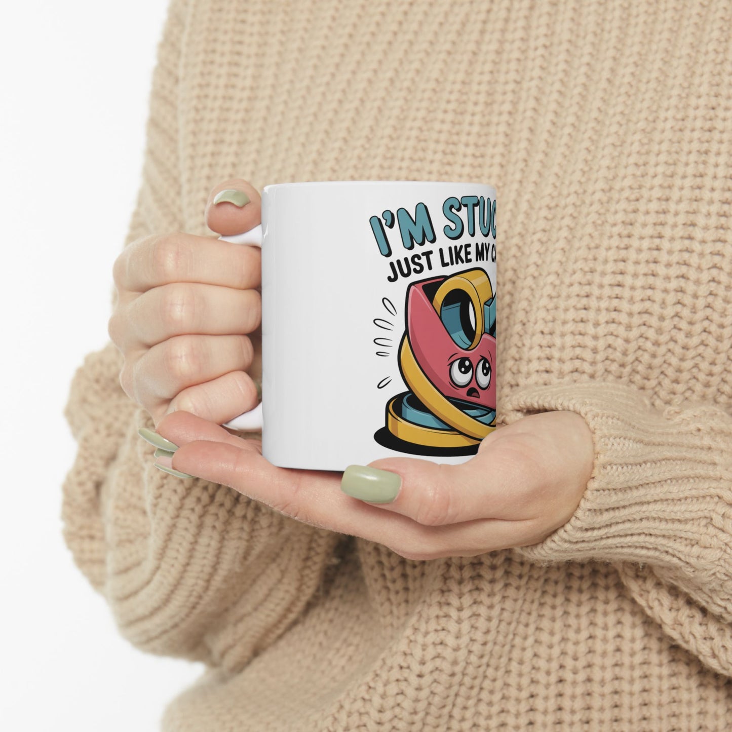 White mug with cartoon character and text "I'M STUCK"