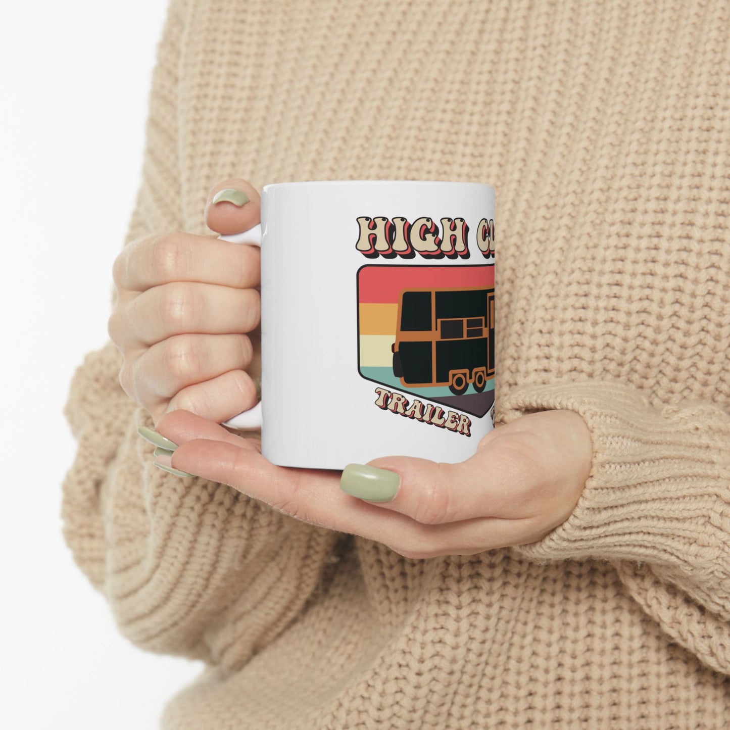 White mug with "High Country Trailer" logo featuring a retro camper van.