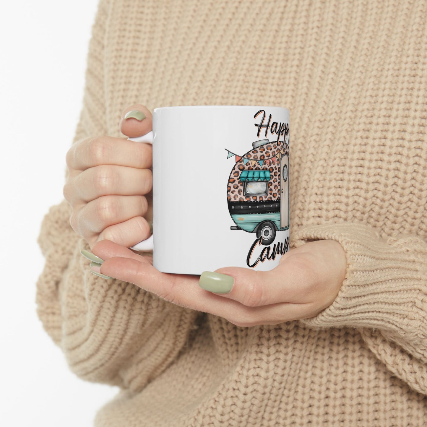 White mug with "Happy Camper" and a caravan illustration.