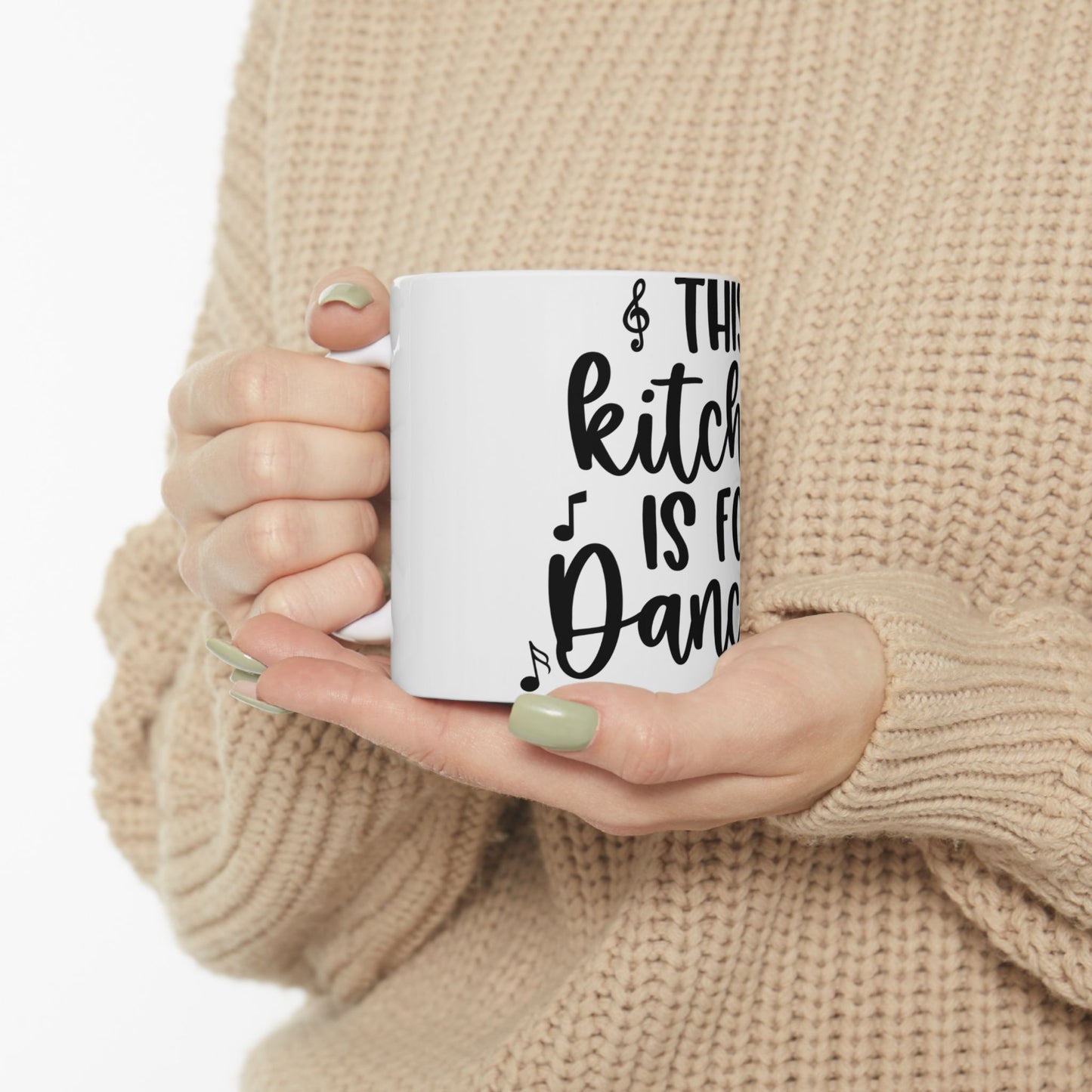 White mug with black text reading "This kitchen is for dancing."