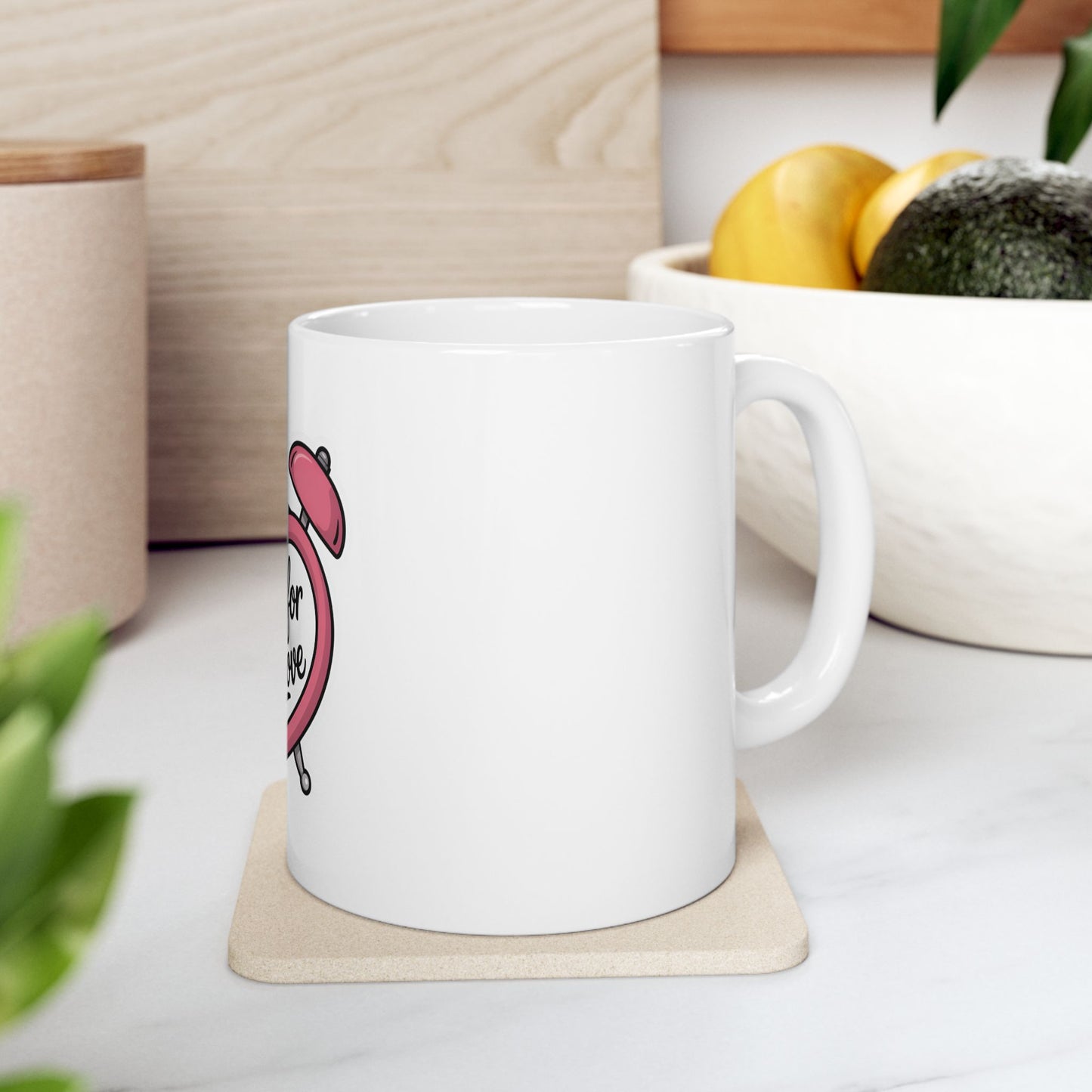 White mug with pink alarm clock design reading "Time for coffee".