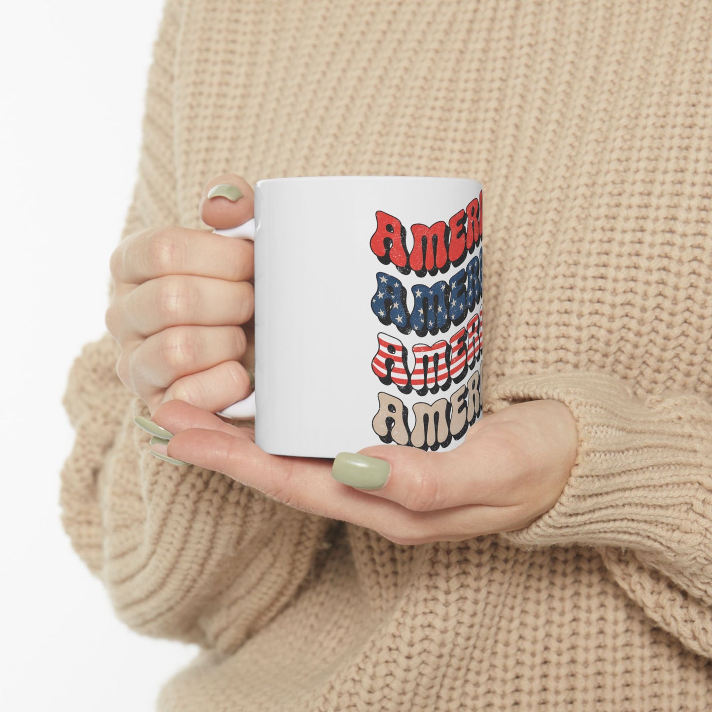 White mug with "AMERICA" repeated in red, white, and blue striped text.