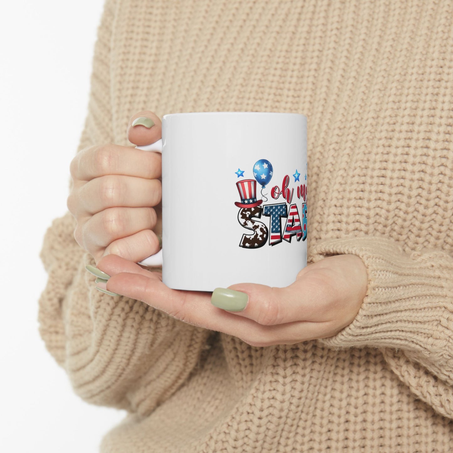 White mug with "Oh, my stars" text and patriotic graphics.