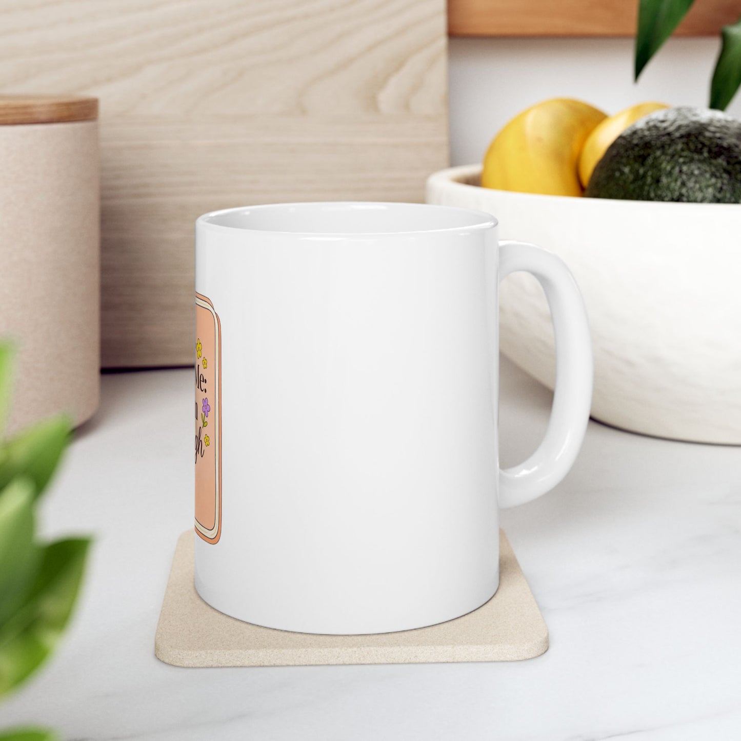 White mug with "Be your own kind of beautiful" text in colorful lettering.
