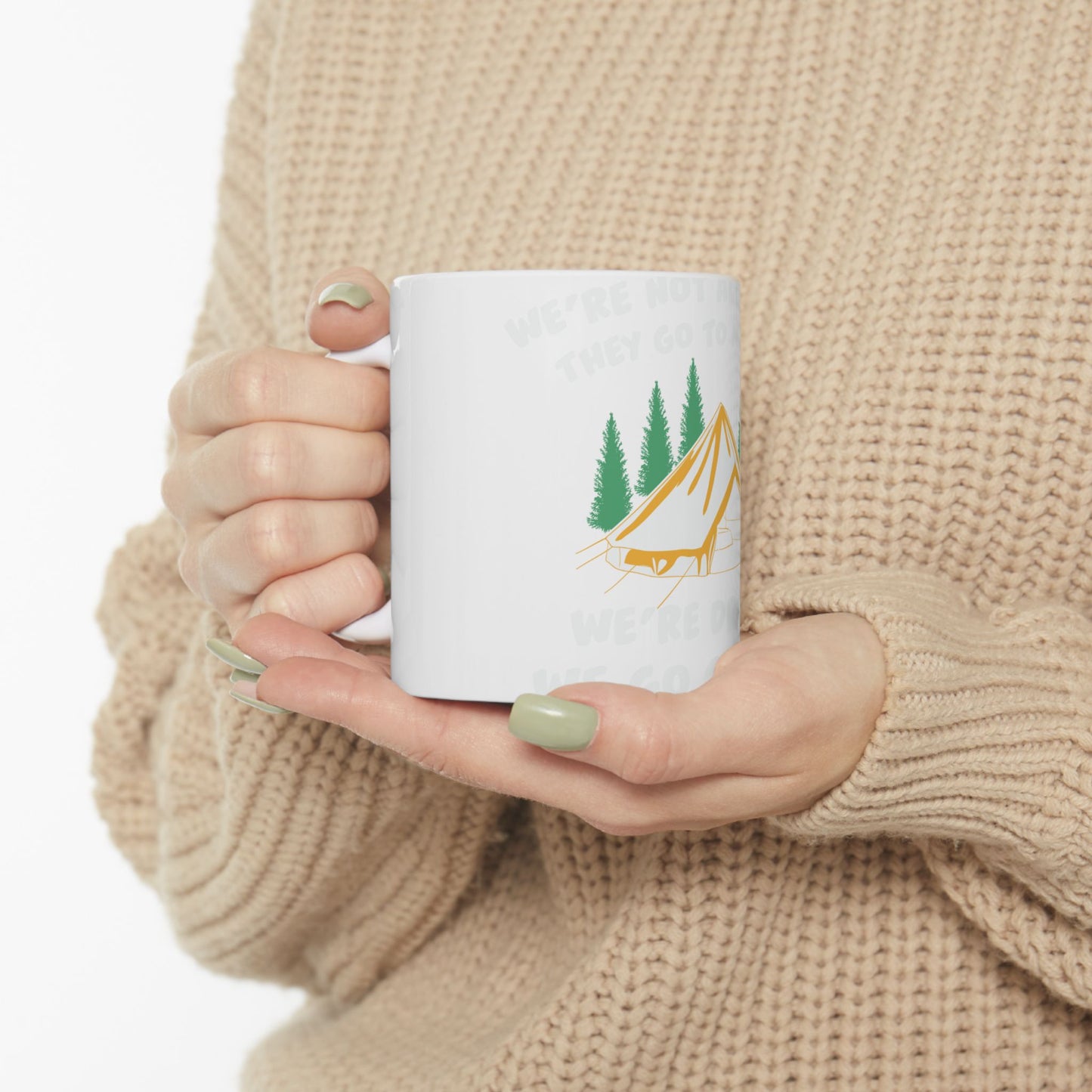 White mug with green tent and trees, text reads "WE'RE NOT GOING TO..."
