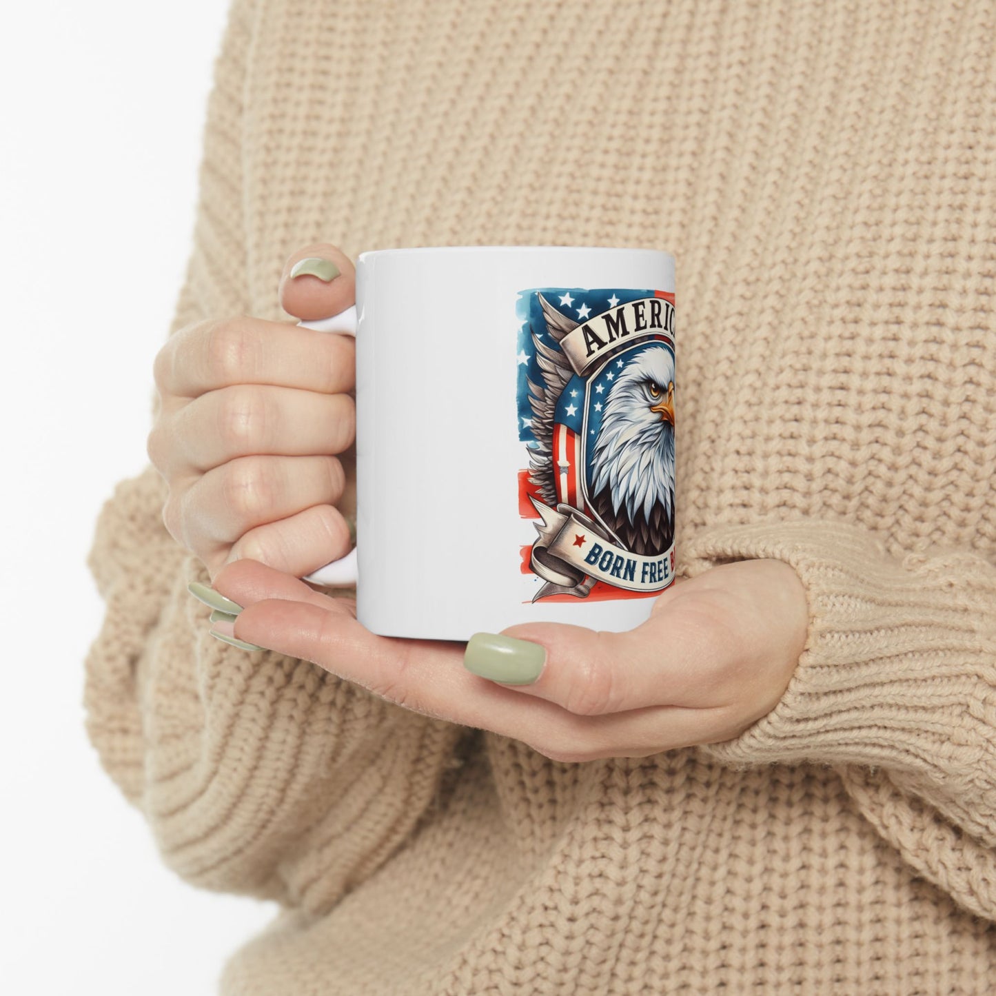 White mug with American flag, eagle, and "America Born Free" text.