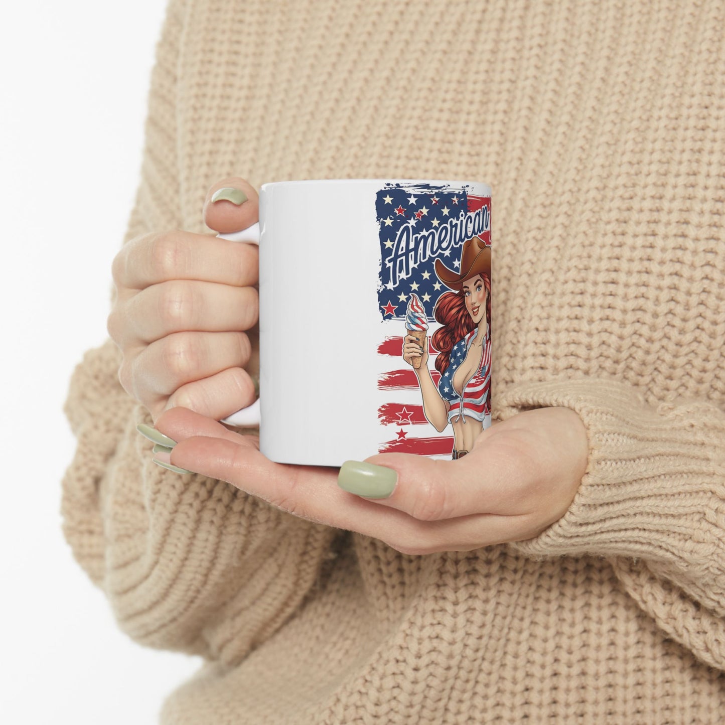 Woman in cowboy hat holds mug with American flag and ice cream cone.