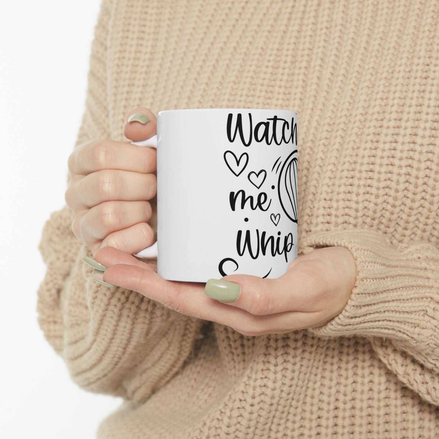 White mug with "Watch me whip" text and a heart and whisk graphic.