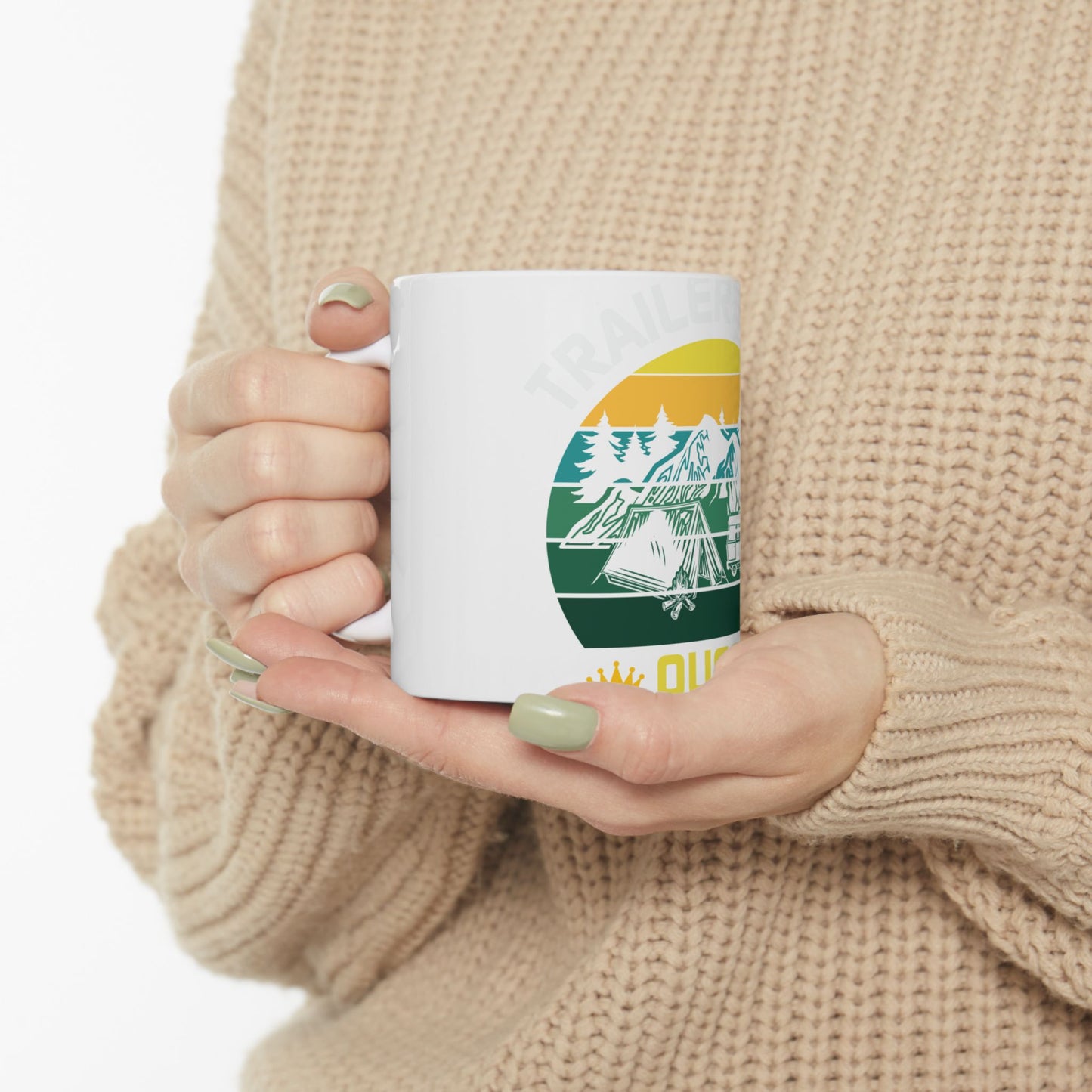 White mug with a camping scene: tent, trees, mountains, and sun.