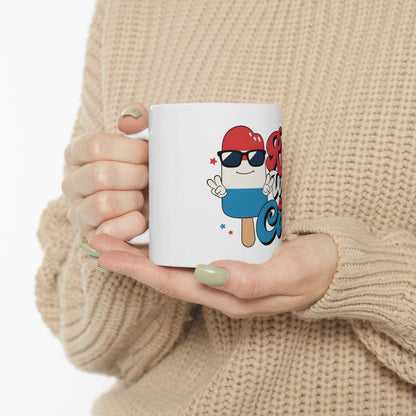White mug with cartoon popsicle and "Summer Vibes" text.