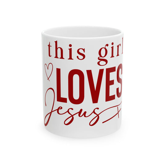 White mug with red text that reads "this girl LOVES Jesus" and a heart.