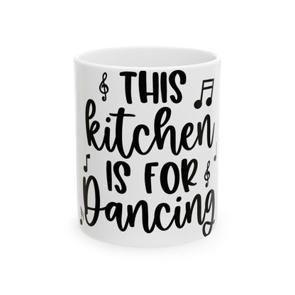 White mug with black text that says "THIS KITCHEN IS FOR DANCING".