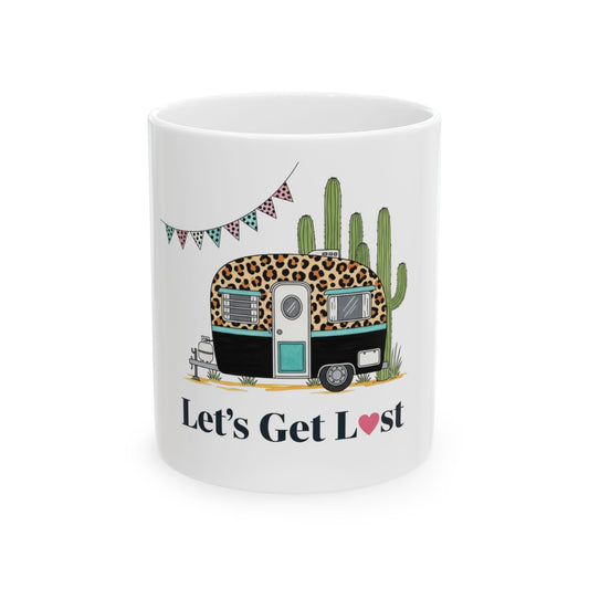 Camper with leopard print, cacti, and banner reads "Let's Get Lost".