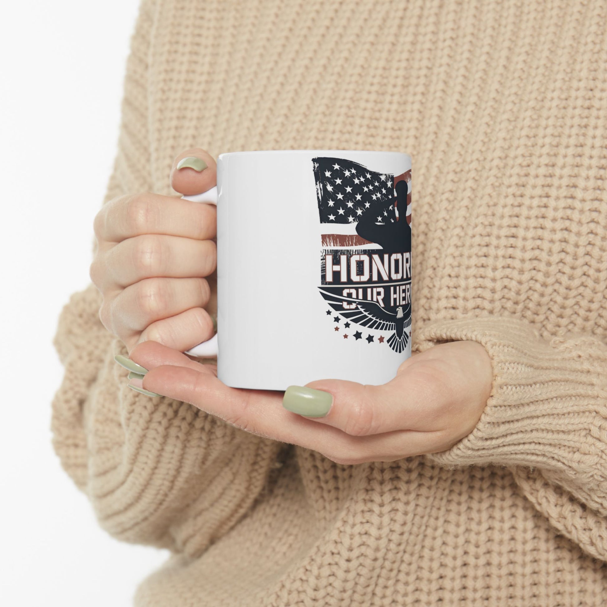 White mug with American flag, eagle, and text "Honor Our Heroes".