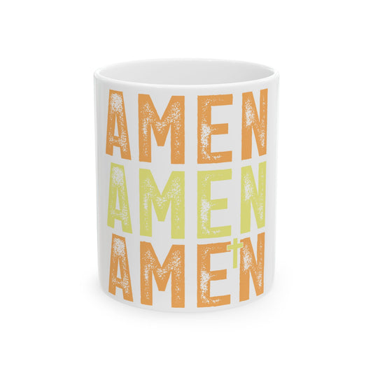 White mug with "AMEN" repeated in orange and yellow.