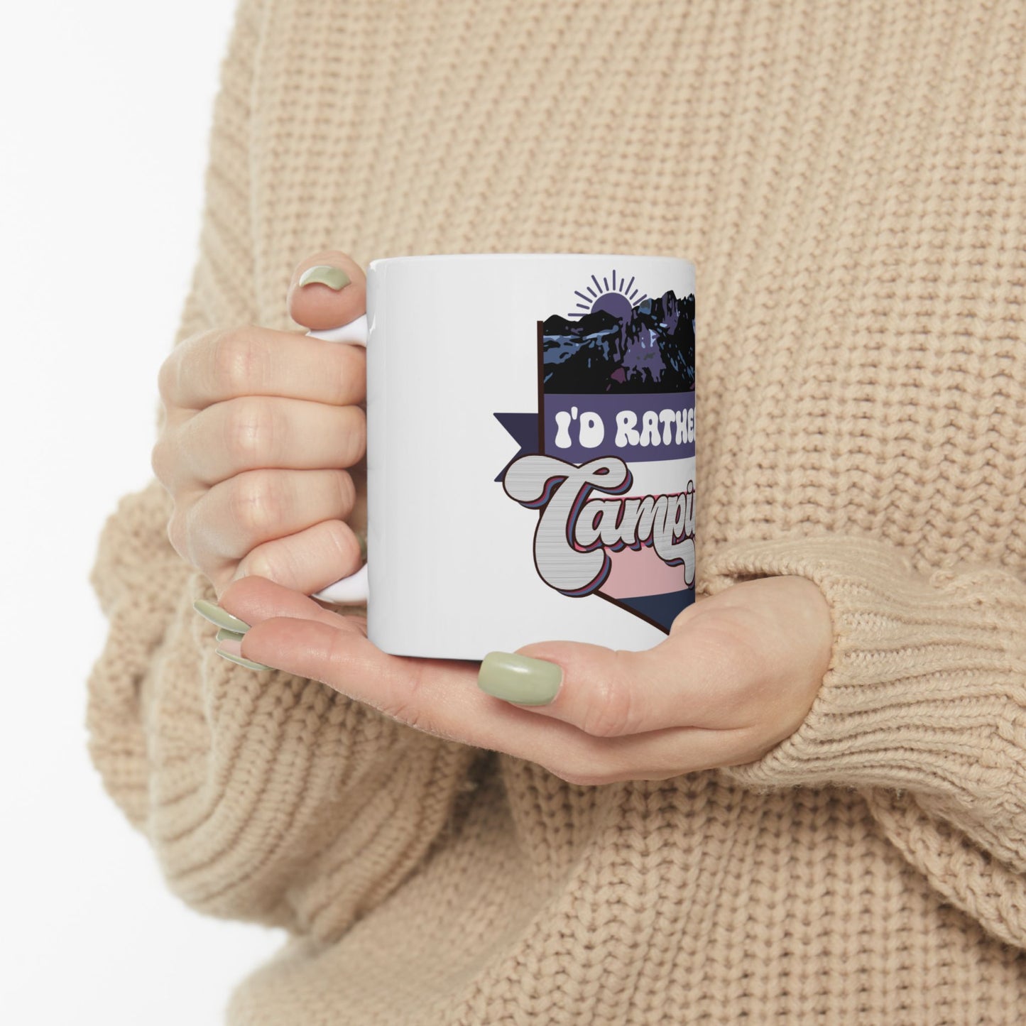 White mug with "I'd rather be camping" text and mountain graphic.