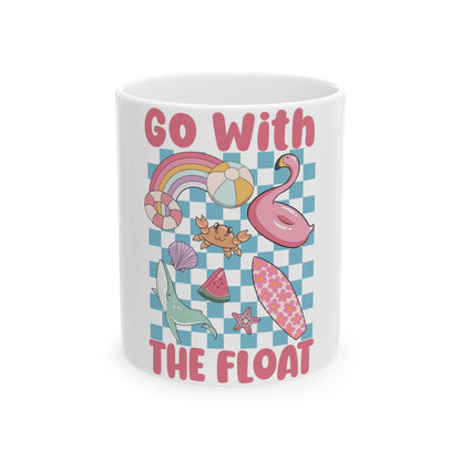 White mug with checkerboard background and summer beach graphics, text reads "GO WITH THE FLOAT".