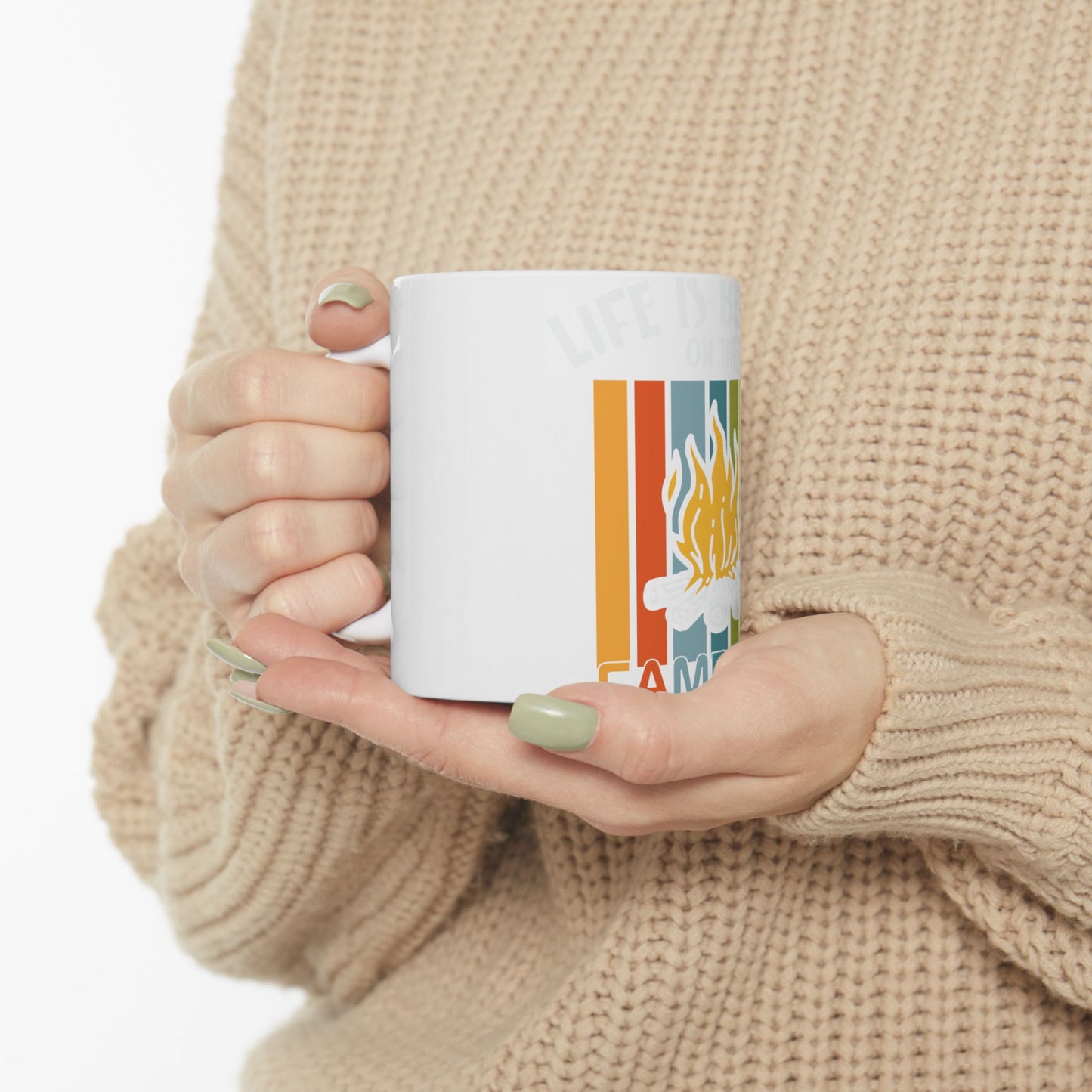 White mug with "Life is better around the campfire" text and flame graphic.