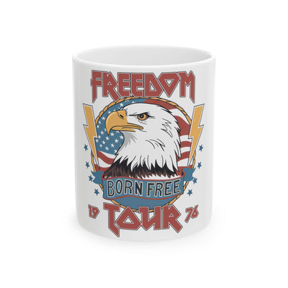 White mug with eagle, "FREEDOM BORN FREE TOUR" text, and lightning bolts.