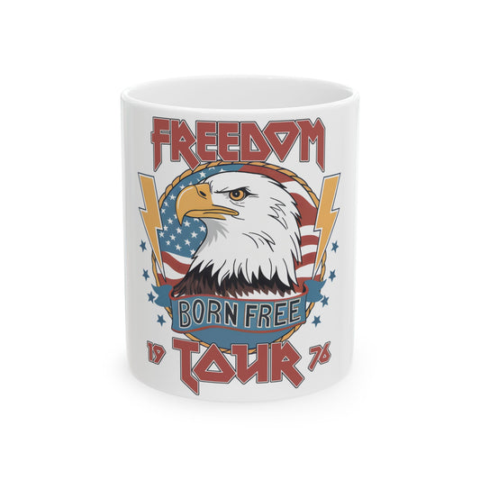 White mug with eagle, "FREEDOM BORN FREE TOUR" text, and lightning bolts.