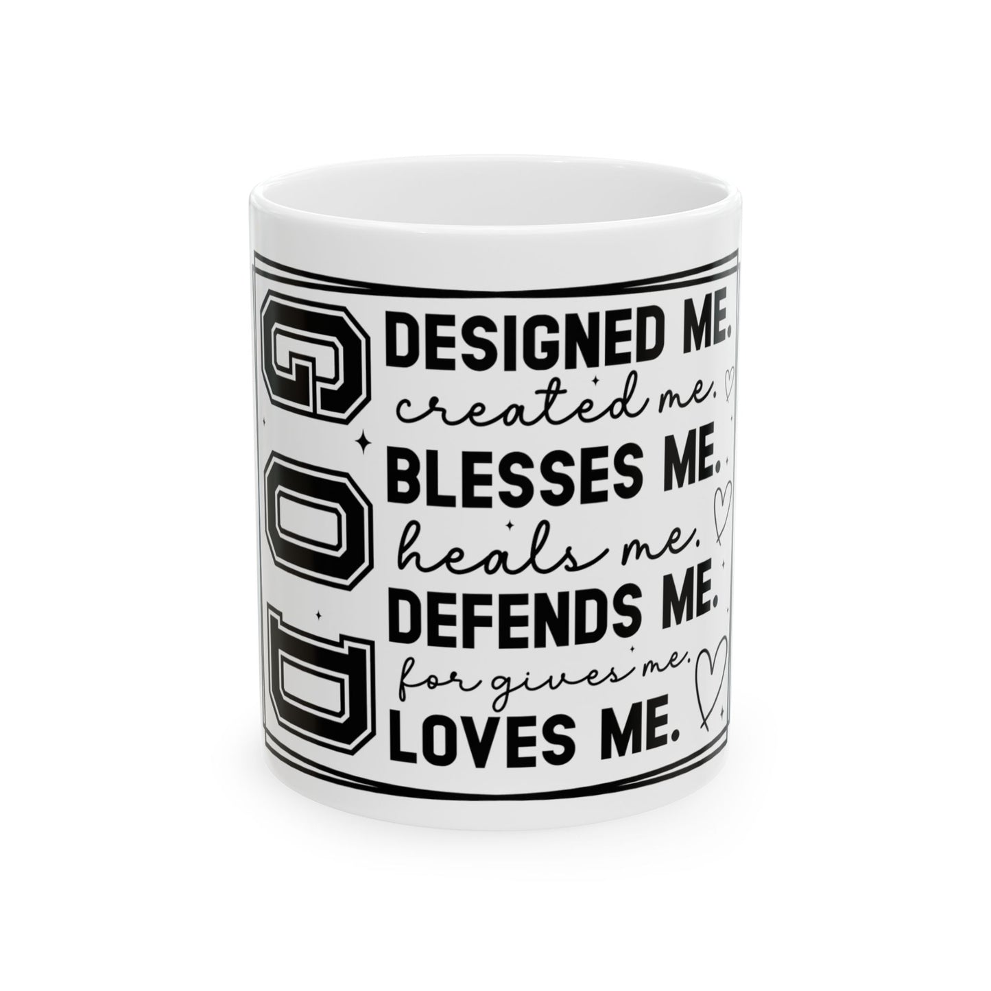 Mug with "GOD DESIGNED ME, BLESSES ME, DEFENDS ME, LOVES ME" text.