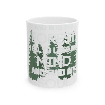 White mug with green trees and the text "Into the forest I go to lose my mind and find my soul."