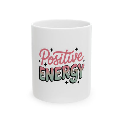 White mug with "Positive Energy" text and colorful stars.
