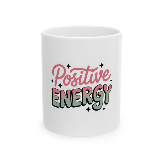 White mug with "Positive Energy" text and colorful stars.