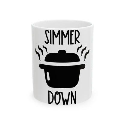 White mug with black "SIMMER DOWN" text and steaming pot graphic.