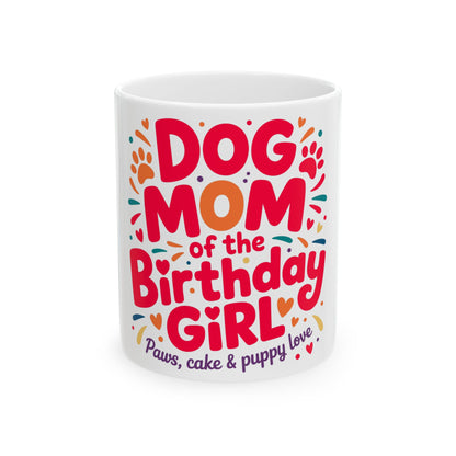White mug with "Dog Mom of the Birthday Girl" text and paw prints.