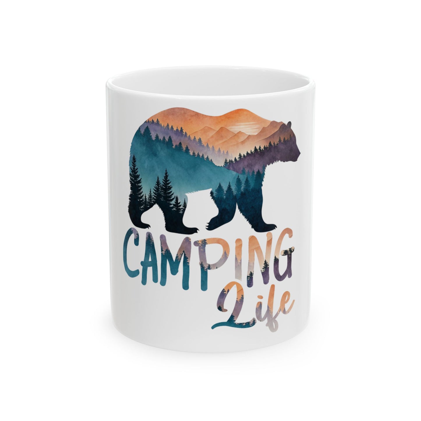 White mug with bear silhouette filled with a mountain forest landscape and "Camping Life" text.