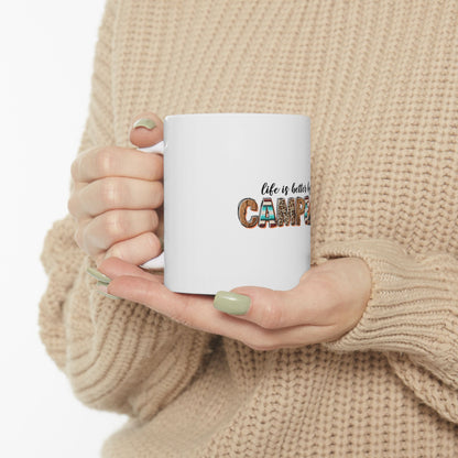 White mug with "Life is better with a Camper" text and leopard print.