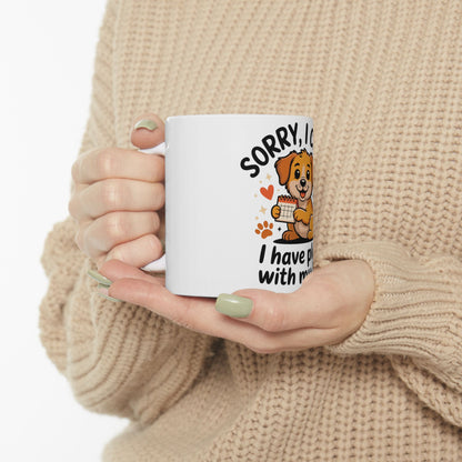 White mug with cartoon dog and text "SORRY, I have p with m"