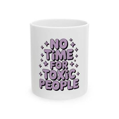 White mug with "No Time For Toxic People" text and stars.