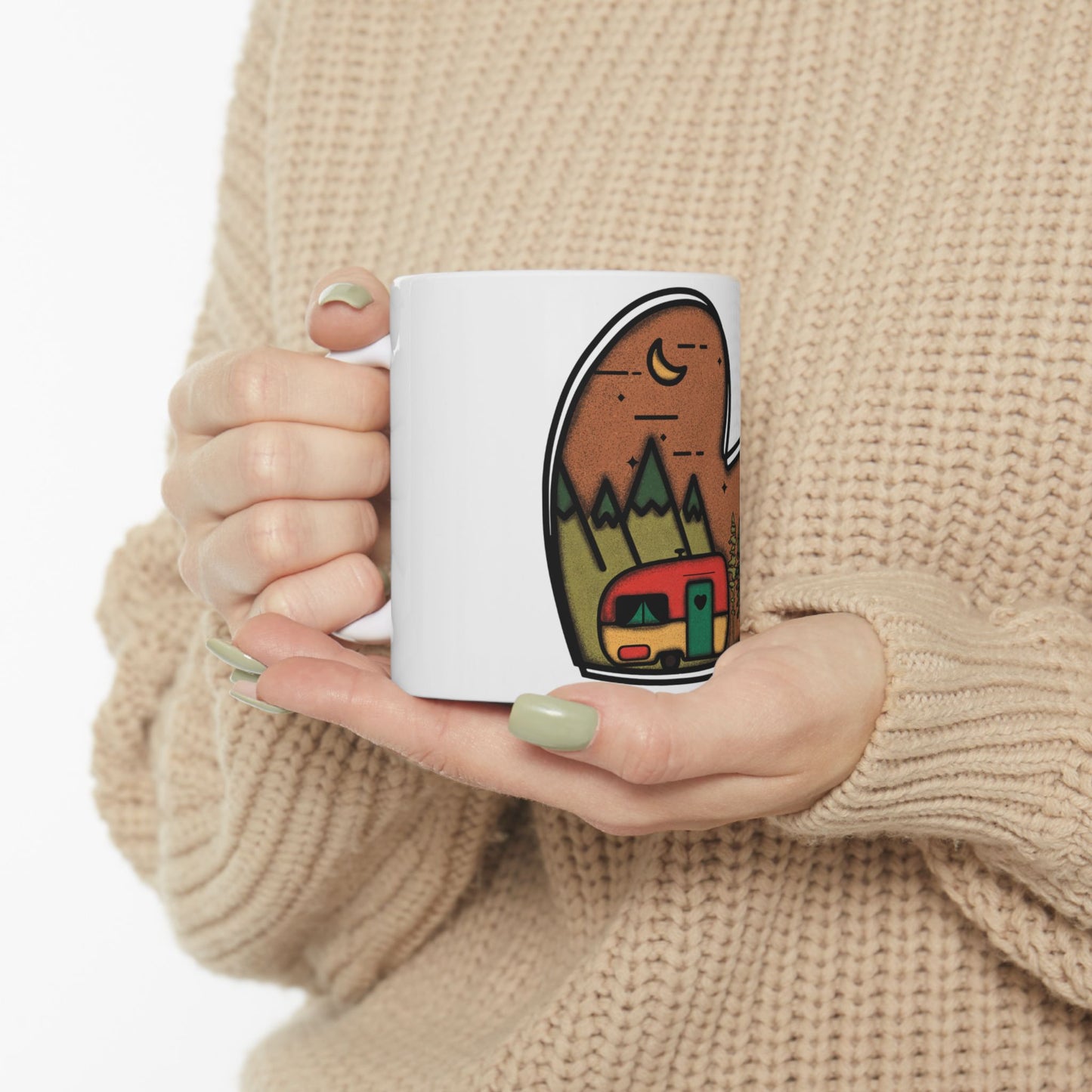 White mug with a heart-shaped camper scene design.