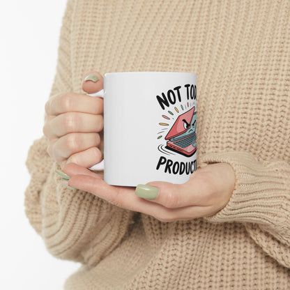 White mug with laptop graphic and text "NOT TOO PRODUCTIVE".