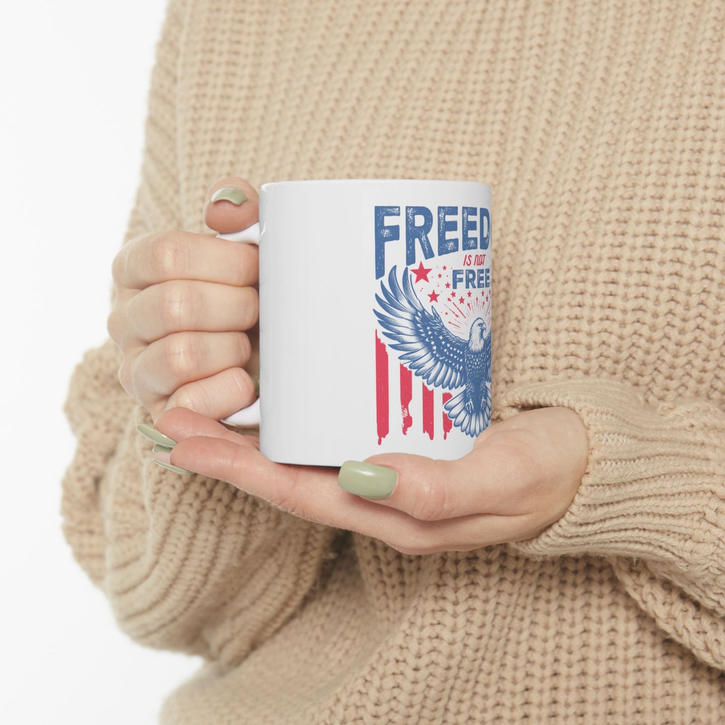 White mug with American flag design and eagle graphic.