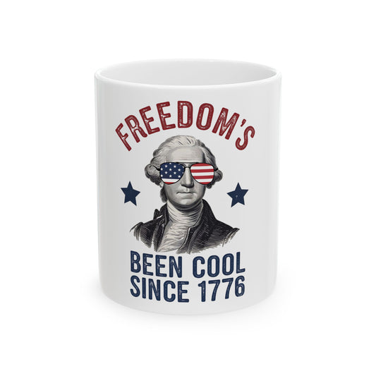 George Washington wearing American flag sunglasses with "FREEDOM'S BEEN COOL SINCE 1776" text.