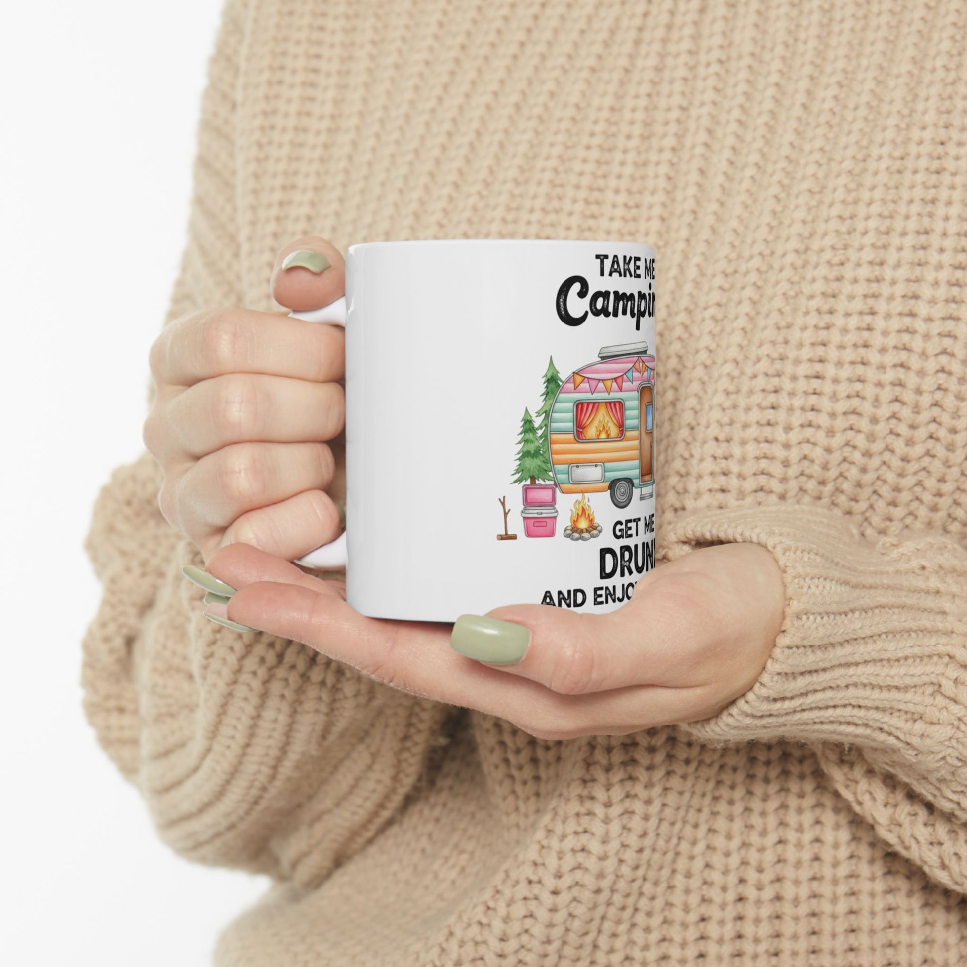 White mug with "Take Me Camping Get Me Drunk and Enjoy" text and cartoon camper.