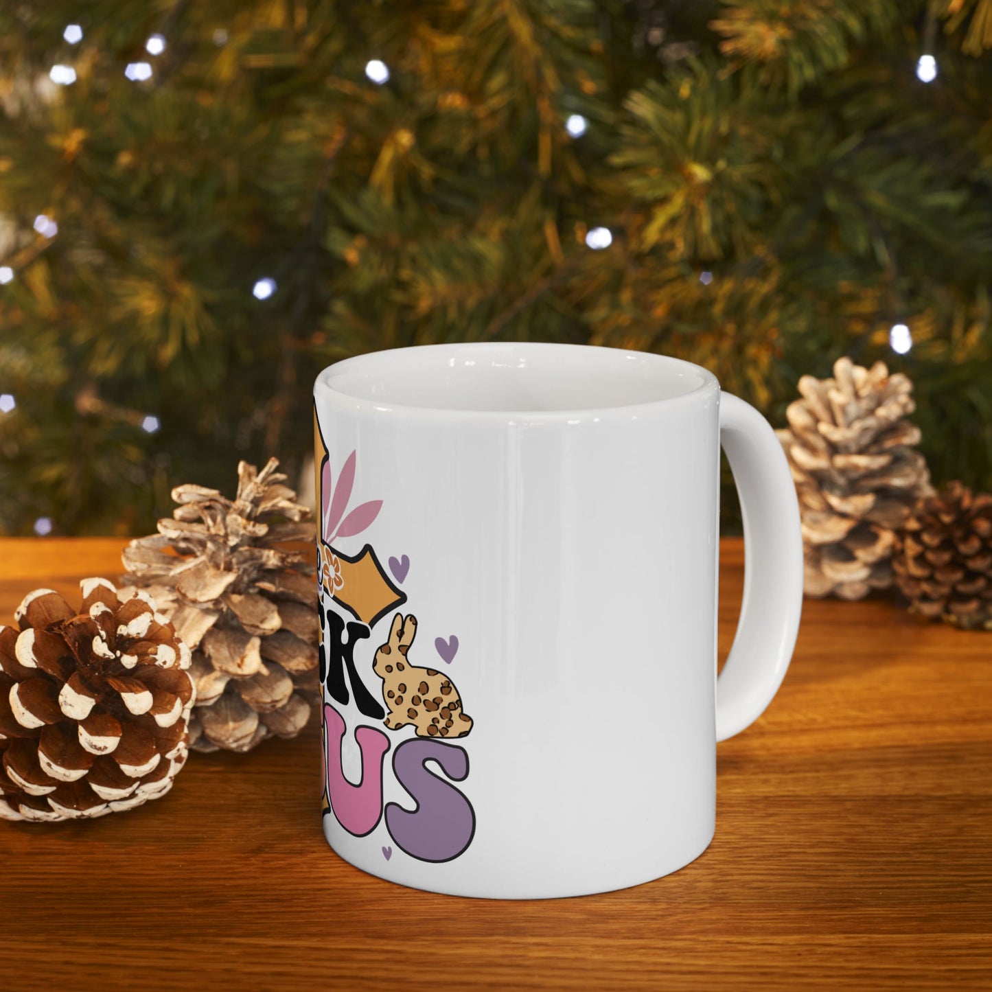 White mug with "Hope" text and Easter bunny and floral graphics.