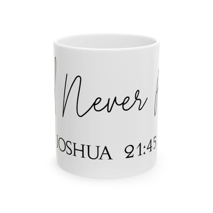 White mug with "Never Alone" and "Joshua 21:45" text.
