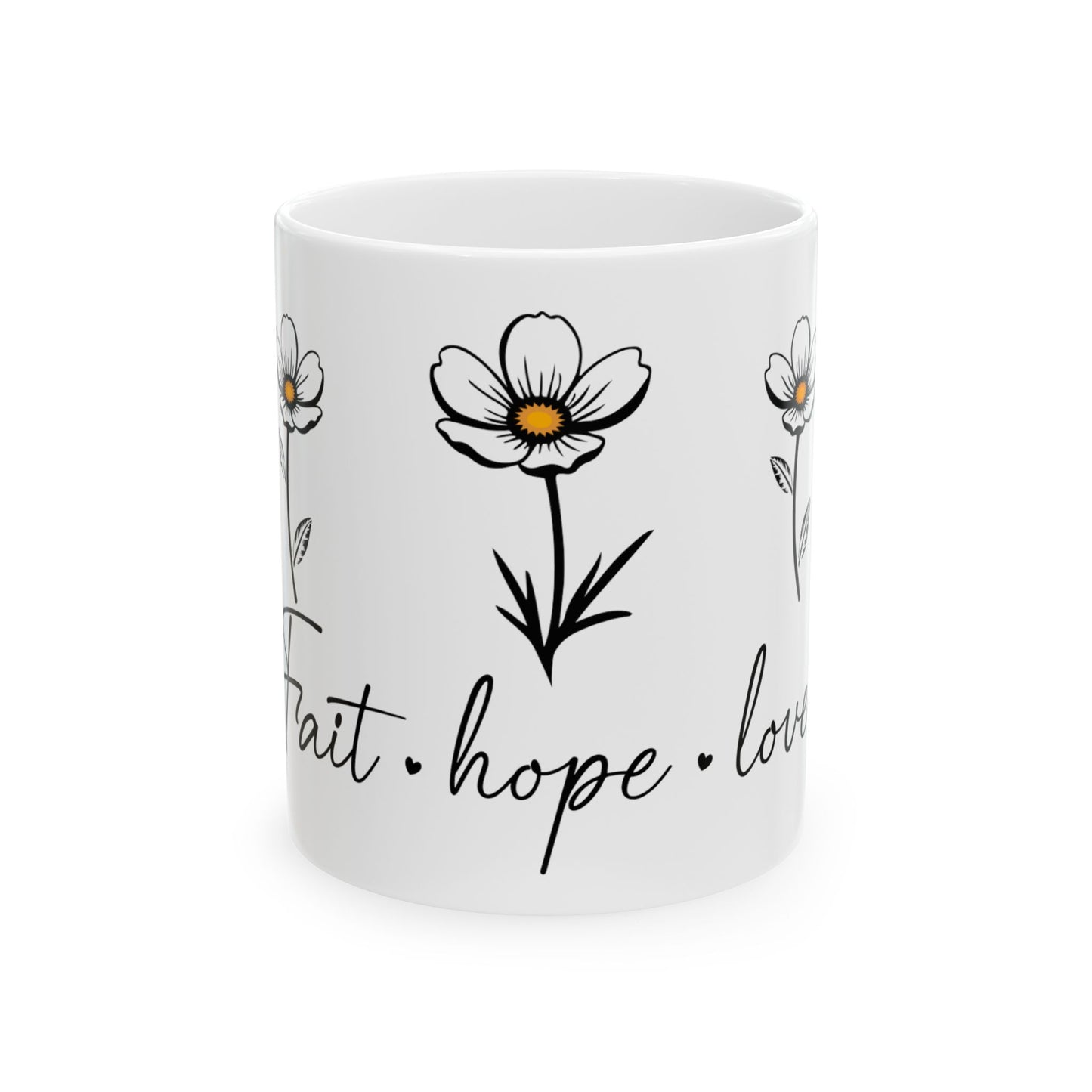 White mug with delicate flower art and "faith, hope, love" text.