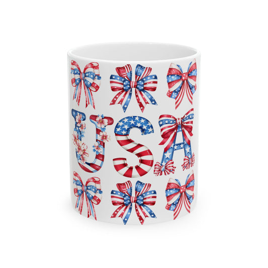 Mug with USA spelled out in patriotic bows and floral letters.