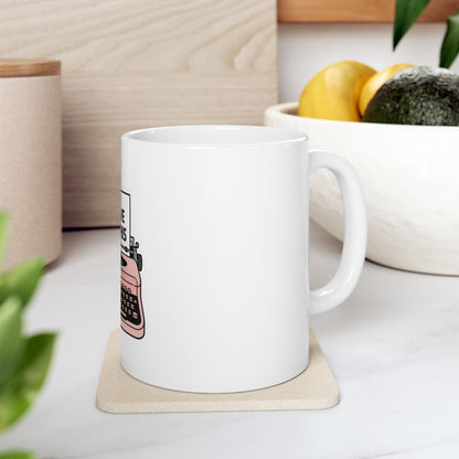 White mug with pink typewriter design and text "Create things".