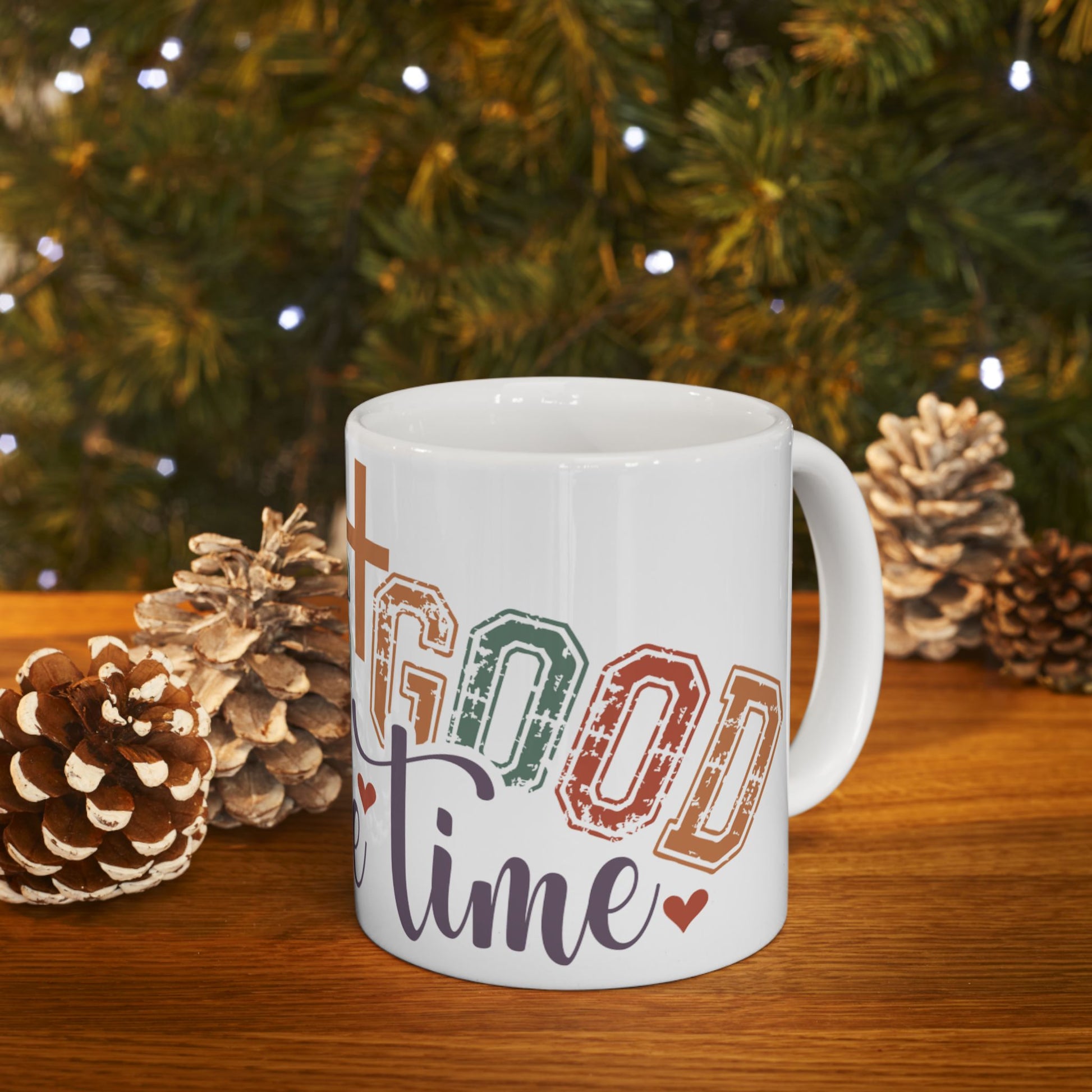 White mug with "It's a good time" text and heart accents.
