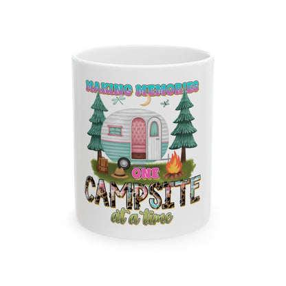 Camper, trees, campfire, and text "Making Memories One Campsite at a Time".