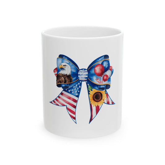 Patriotic bow with eagle, balloons, and sunflower on a white mug.