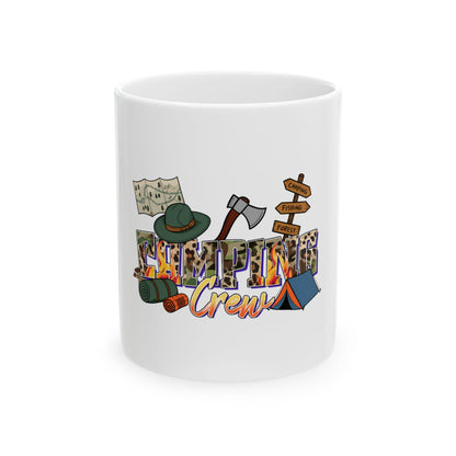 White mug with "Camping Crew" text, axe, map, tent, and hat.